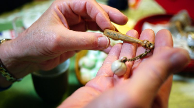 My mother had carved a baseball bat and made this little trinket…you can see Kenichiro’s writing on it…