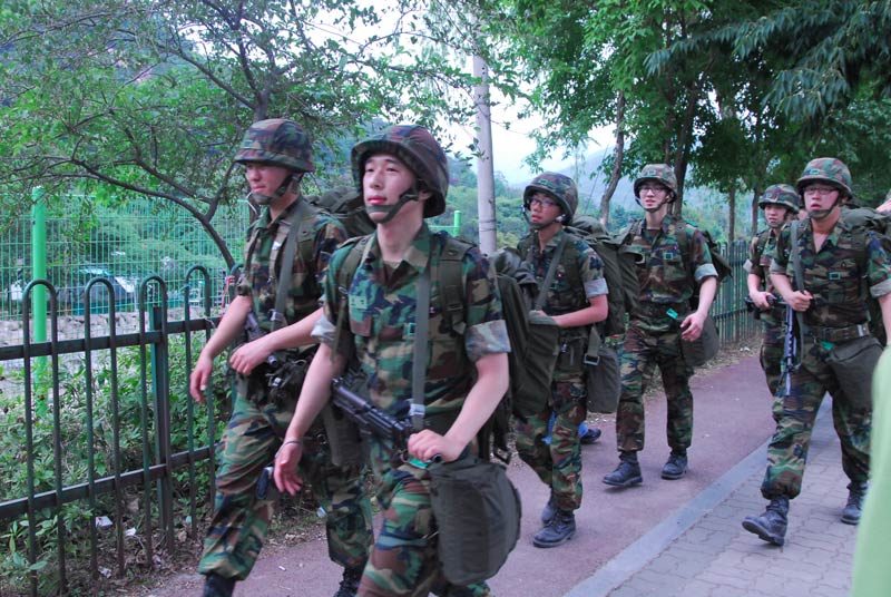 On our way back from Bukansan mountain, we encountered a group of soldiers. I can only imagine what it is like to march through the mountains on a hot summer day in full fatigues and 40 lbs strapped to your back.