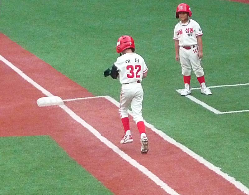 “BALL!!!” Adam gets walked!!! Adam jogs…no…he bounces like a gazelle to first base… He was just walked by the best pitcher in the league…who is now a bit pissed off that he walked Adam on ESPN…