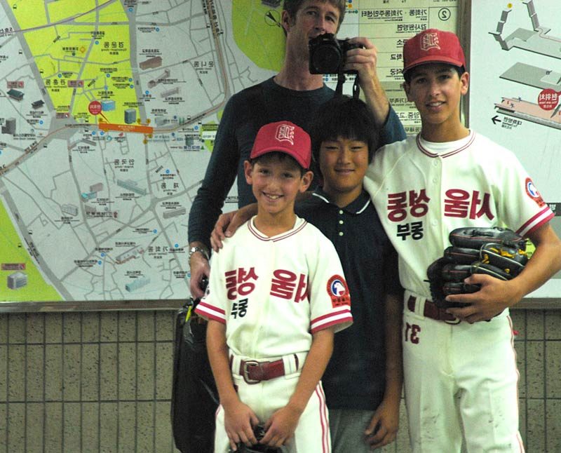 Here we are with Ohkyu after the game. Ohkyu is great and very impressed with Austin.