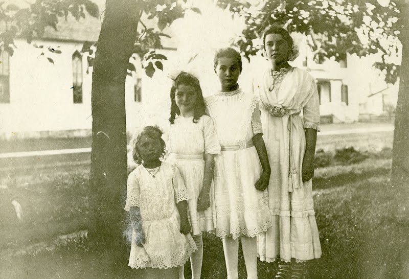 This is a postcard photo of my grandmother Eulah Maxwell (tallest on the right), her sister, Margaret and her two cousins, Margaret and Nellie Barr. Circa 1910, Fairgrove, Michigan.
