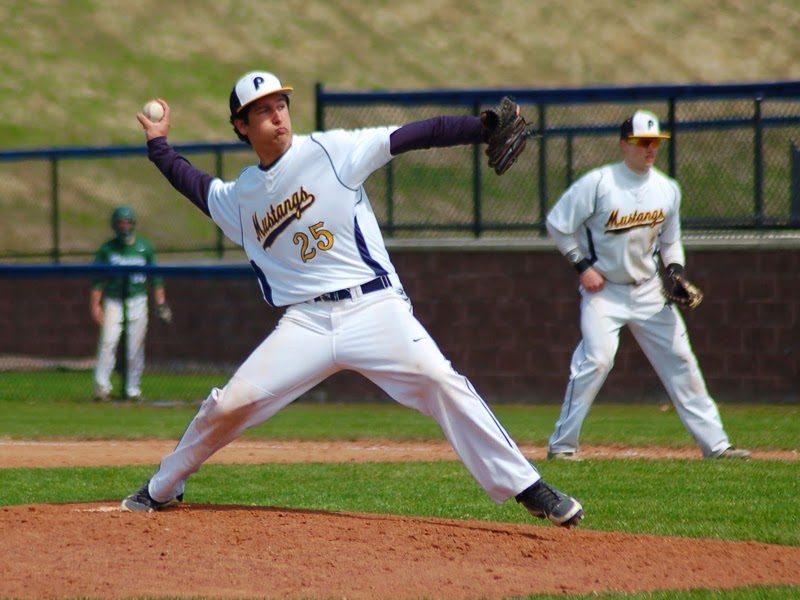 Austin pitching for the Portage Central Mustangs.