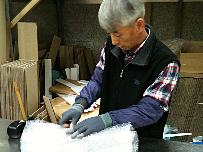 (The box maker starting the process)
