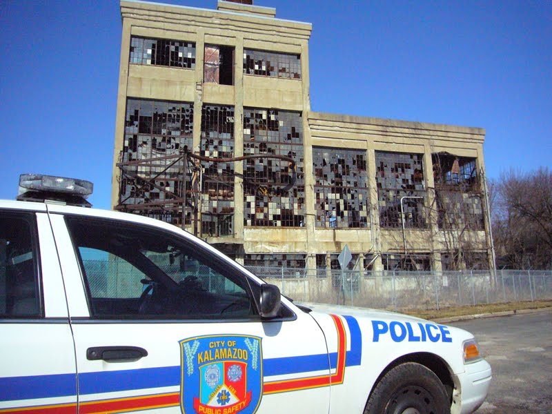 A couple of years ago, I was showing my kids an abandoned paper mill (we exploring…). I told them how Kalamazoo used to be one of the largest paper manufactures in the country. I didn’t mention that I thought the land is part of the government’s Superfund and we were likely standing above tons of buried toxic waste. Oh!!! because we did not belong on the property…the police came speeding up to us in an interceptor. From a distance, they figured we were crystal meth dealers looking to use the abandoned building as a lab. That is a problem with abandoned buildings like this…the police told us they recently closed down a lab here…